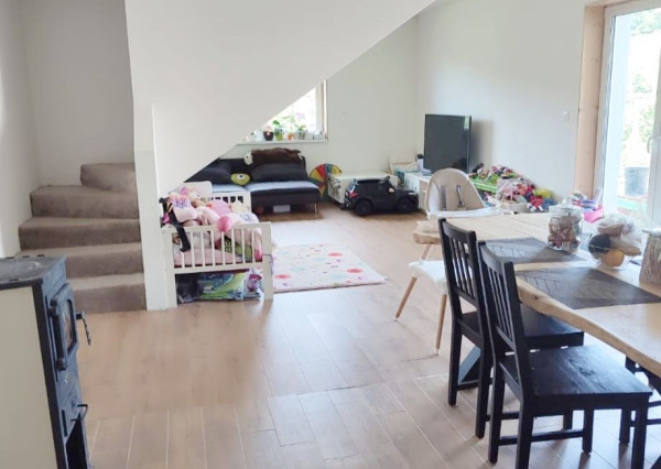 Byt v novostavbe so záhradou neďaleko tajchu a centra mesta