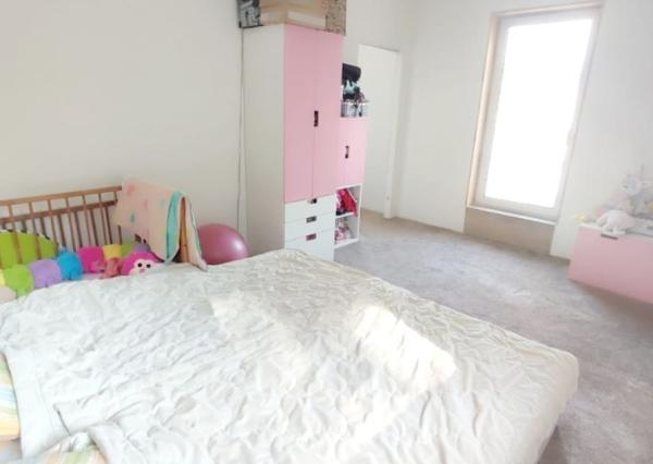 Byt v novostavbe so záhradou neďaleko tajchu a centra mesta