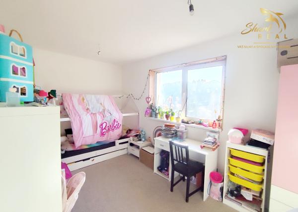 Byt v novostavbe so záhradou neďaleko tajchu a centra mesta