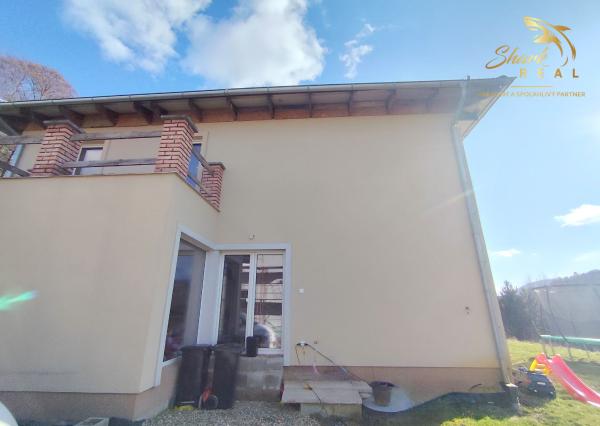 Byt v novostavbe so záhradou neďaleko tajchu a centra mesta