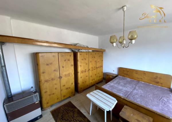 Rodinný dom s veľkým pozemkom na predmestí Hlohovca