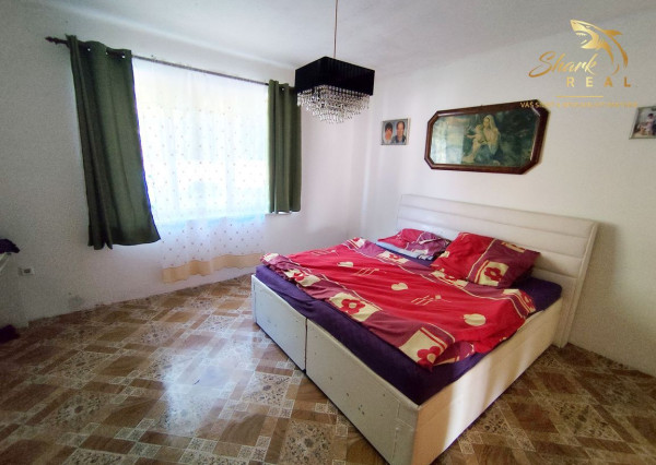 Stavebný pozemok so starším domom a predaj 