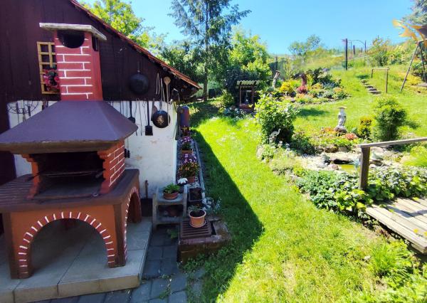 REZERVOVANÉ! Novinka! Dom s čarovnou záhradou a výhľadom na prírodu