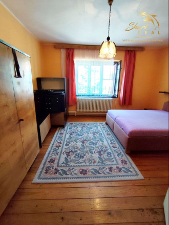 Priestranný a udržiavaný rodinný dom na predaj - fotografia 9