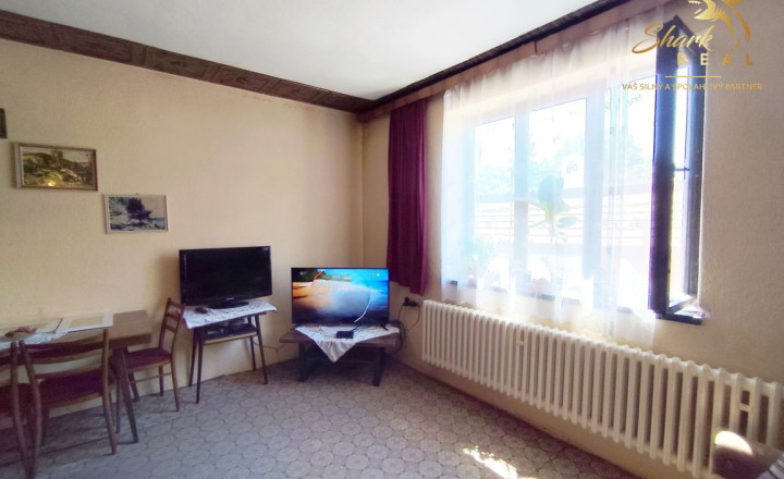Priestranný a udržiavaný rodinný dom na predaj - fotografia 16