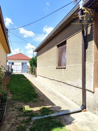 Priestranný a udržiavaný rodinný dom na predaj - fotografia 27