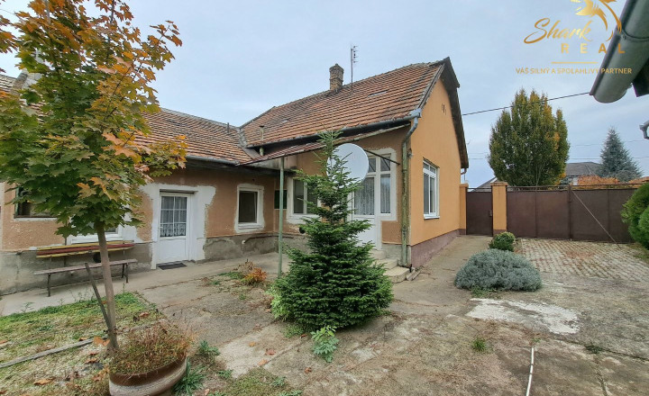 Rodinný dom s pozemkom vhodným na podnikanie - fotografia 12