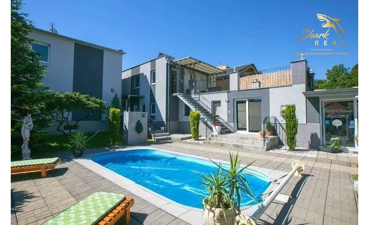 Jedinečná apartmánová nehnutelnosť s bazénom a záhradou - fotografia 1